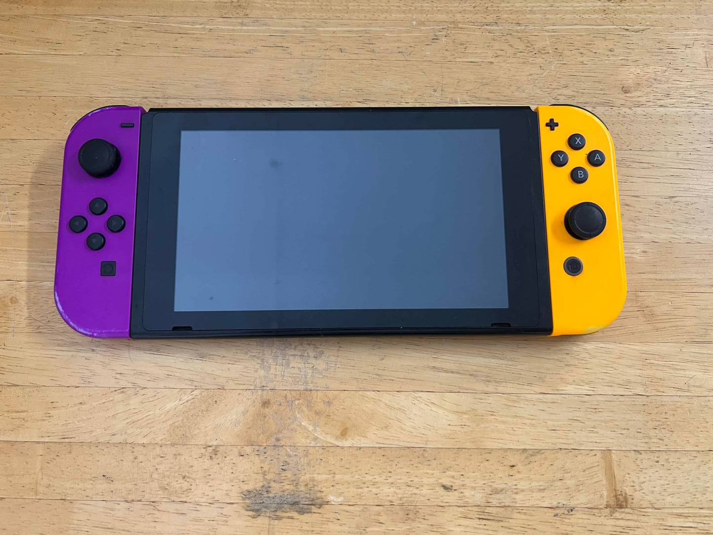 Nintendo Switch purple and orange joy cons w dock + 128 gb sd (pre-owned)