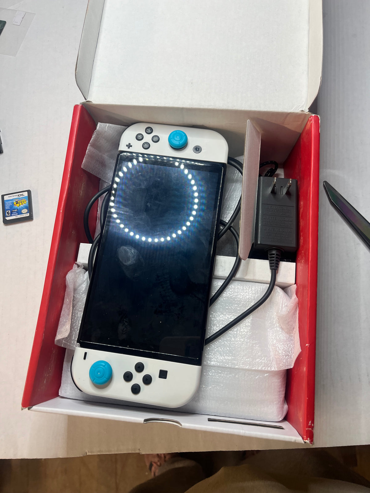 Nintendo Switch OLED with White Joy-Con
